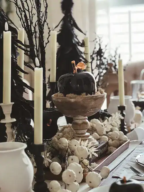 Black and white Halloween decorations on a tablescape