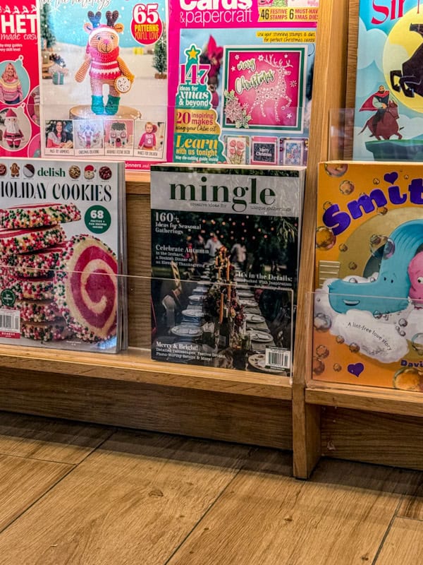 Mingle Magazine on a rack with other craft and holiday magazines 